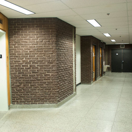 Image of elevator, washrooms and water fountain on 1st floor, with the Lower Gallery entrance behind the viewer
