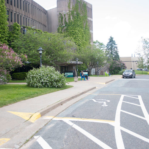 View of the entrance to Seton Academic Centre from accessible parking spots